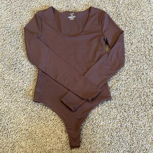 Nuuds long sleeve bodysuit